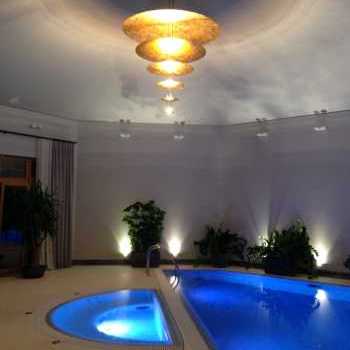 Wall covering: SICIS mosaic, lighting by Cattelani & Smith
